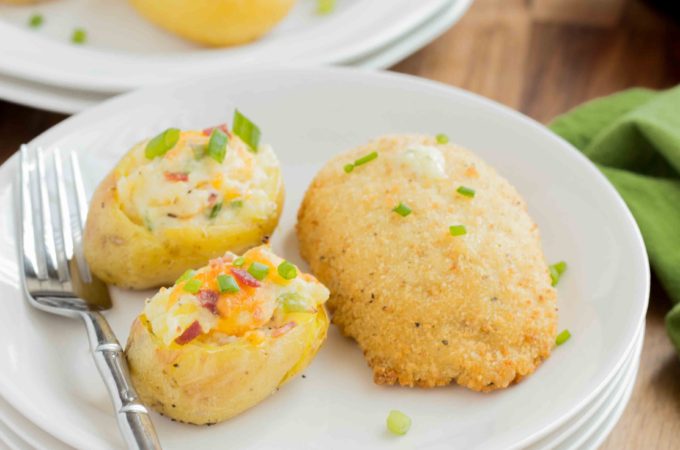 Mini Twice Baked Potatoes ~ Potatoes baked to perfection then loaded with bacon, green onions and cheese. All the yummy things you need for a side! These mini twice baked potatoes are the perfect side.
